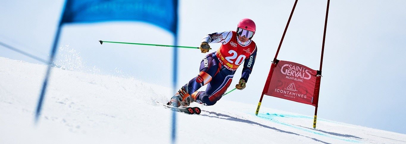 US Telemark Ski Team competing at Eldora Mountain Resort, Colorado, performing telemark turns during the 2026 Nationals.